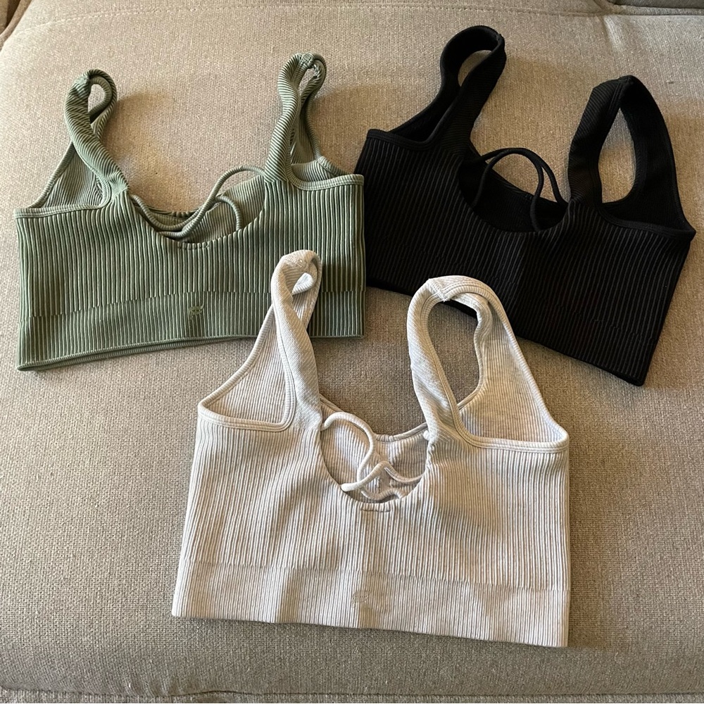 Fabletics Set of Three Ribbed  bras - Green, Black, and White size medium